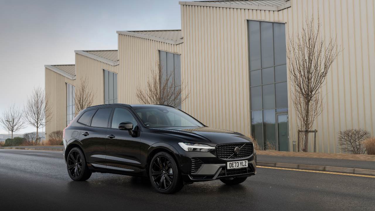 Volvo XC60 black parked on residential street