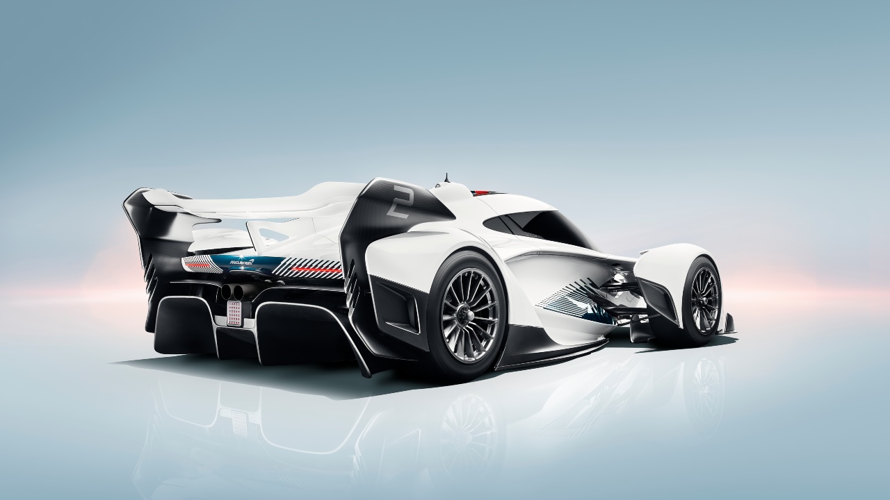 McLaren Solus GT track-focused hypercar shown from rear three-quarter angle in a studio setting