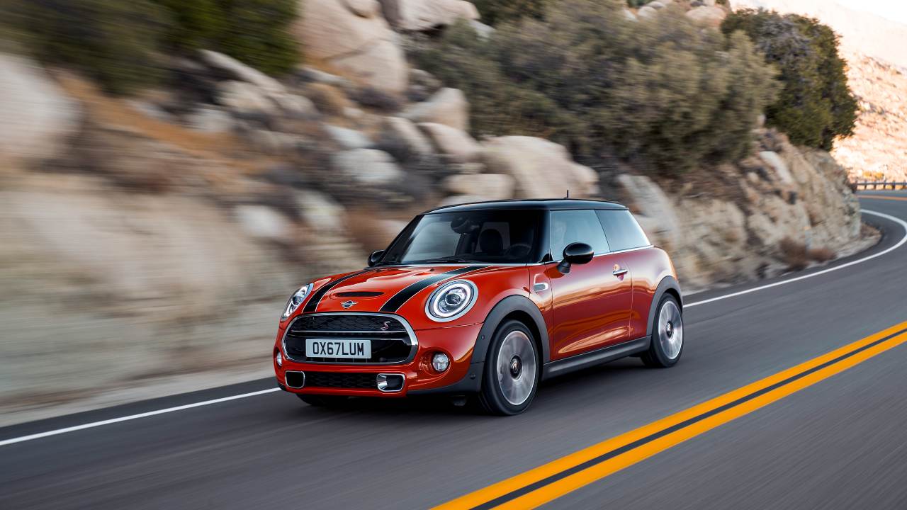 Red MINI Hatch Exterior Front Driving