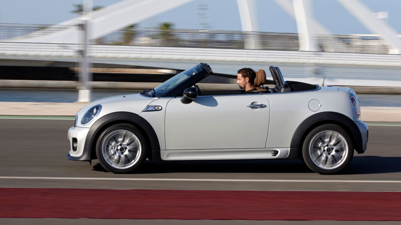 White MINI Roadster Exterior Side Driving