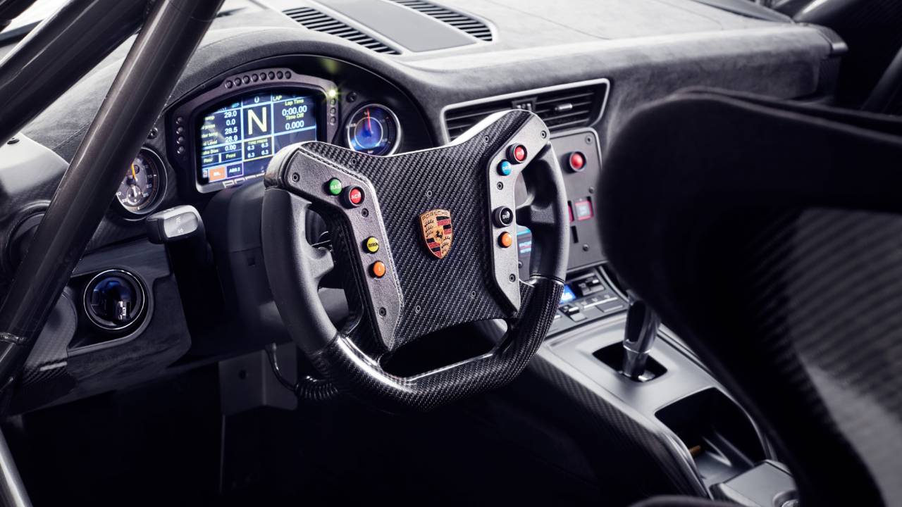 Porsche 935 interior view with racing steering wheel