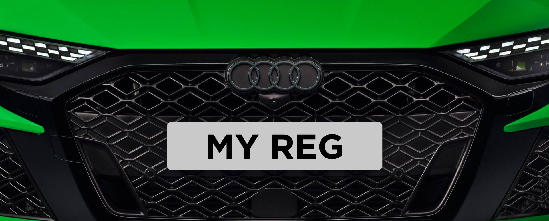 Green Audi RS3 front end with the number plate 'MY REG' 