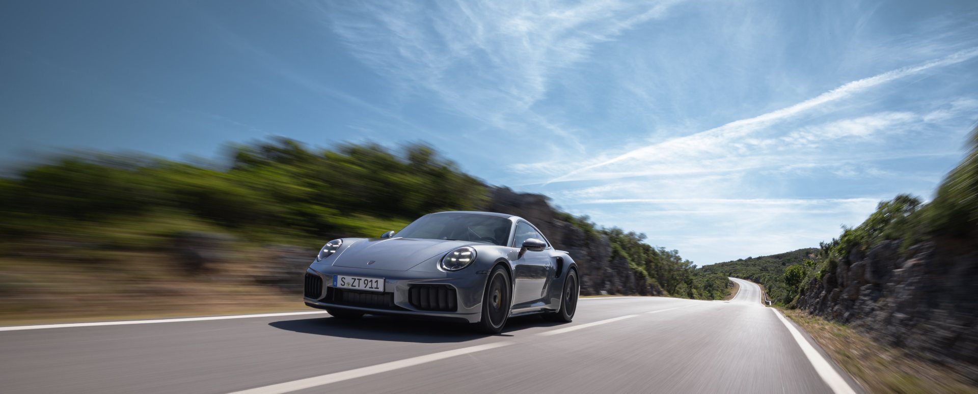 Silver Porsche 911 Turbo S Exterior Front Driving
