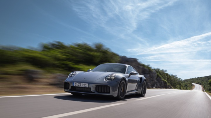 Silver Porsche 911 Turbo S Exterior Front Driving