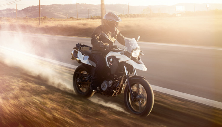 Motorcyclist Riding BMW Motorrad F 700 GS Off-Road