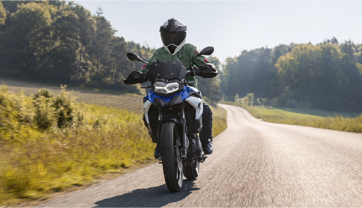 Motorcyclist Riding BMW Motorrad F 800 GS On Road