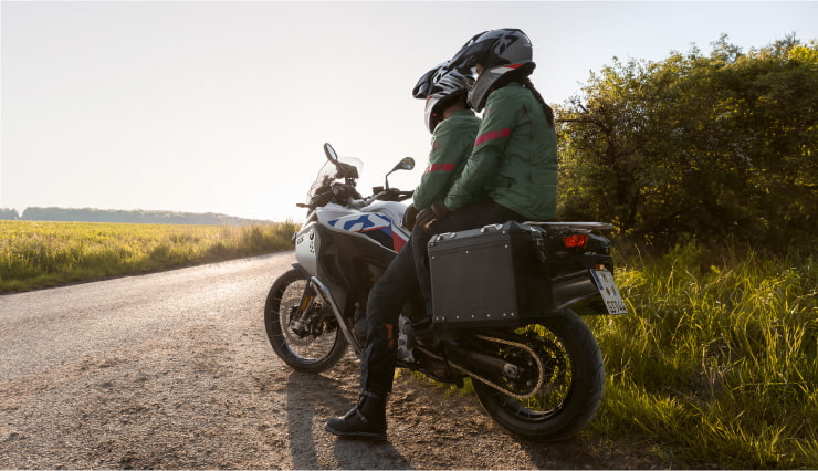 Motorcyclist Sitting on BMW Motorrad F 900 GSA On Side of Road