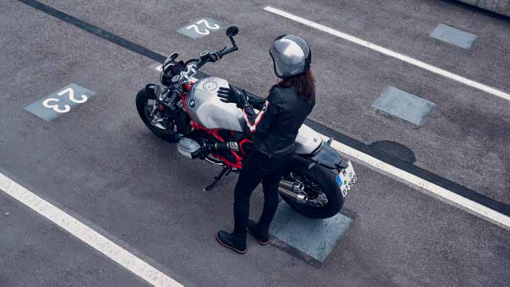 Motorcyclist Standing Next to BMW R 12 NineT