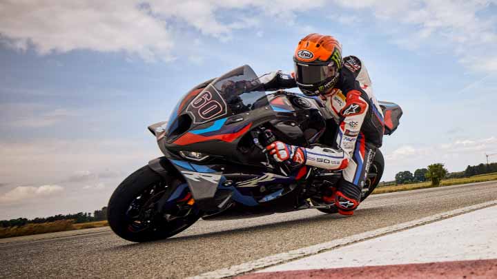 Motorcyclist Riding BMW 1000 RR On Track