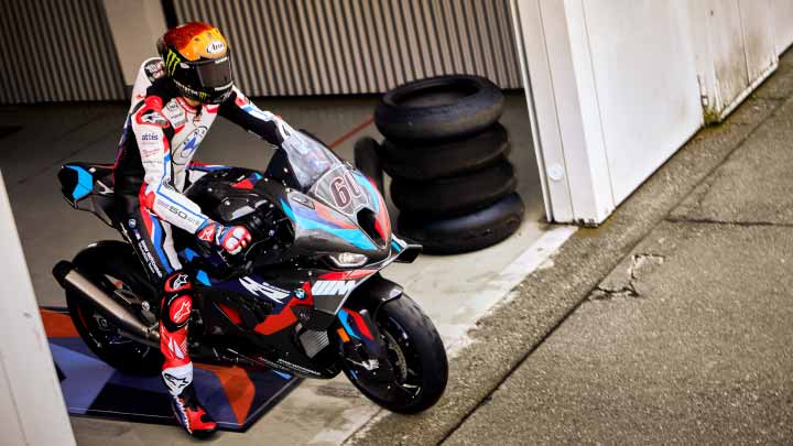 Motorcyclist Riding BMW 1000 RR On Track