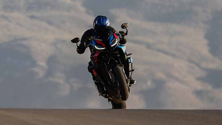 Rear Shot of Motorcyclist Riding BMW 1000 XR