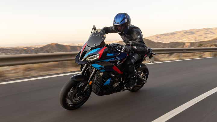 Motorcyclist Riding BMW 1000 XR On Track