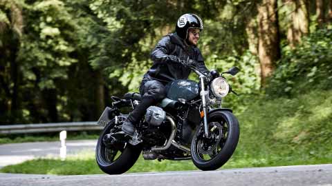 Motorcyclist Riding BMW R NineT Pure On Road