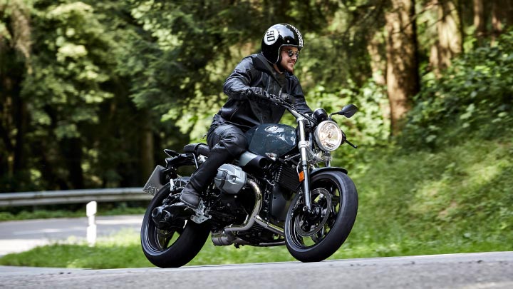 Motorcyclist Riding BMW R NineT Pure On Road
