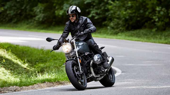 Motorcyclist Riding BMW R NineT Pure On Road