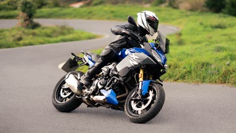 Motorcyclist Riding Blue BMW F 900 XR