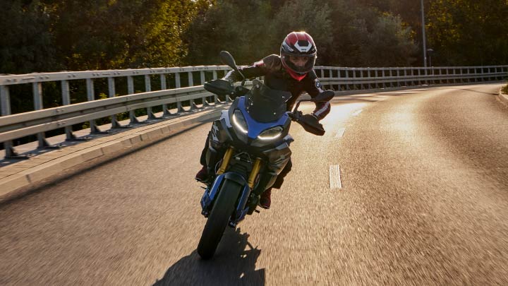 Motorcyclist Riding Blue BMW F 900 XR