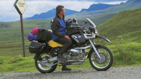 Motorcyclist Riding BMW RR 1100