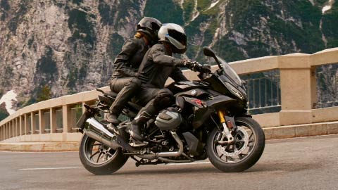 Motorcyclists Riding R 1250 RS On Road