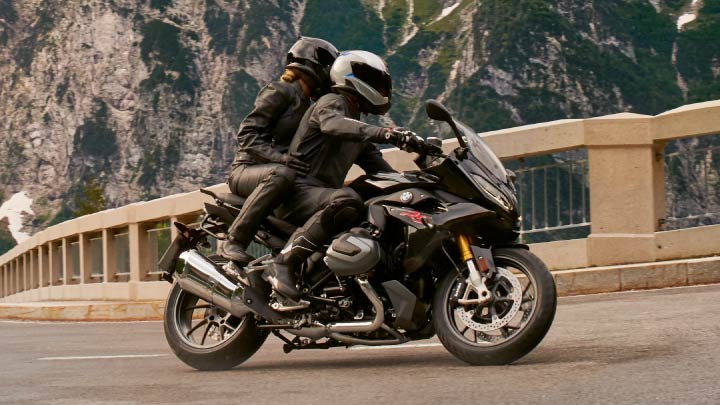 Motorcyclists Riding R 1250 RS On Road