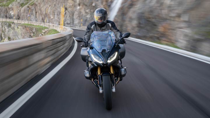 Motorcyclist Riding R 1250 RS On Mountain Road