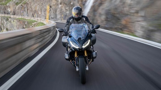 Motorcyclist Riding R 1250 RS On Mountain Road
