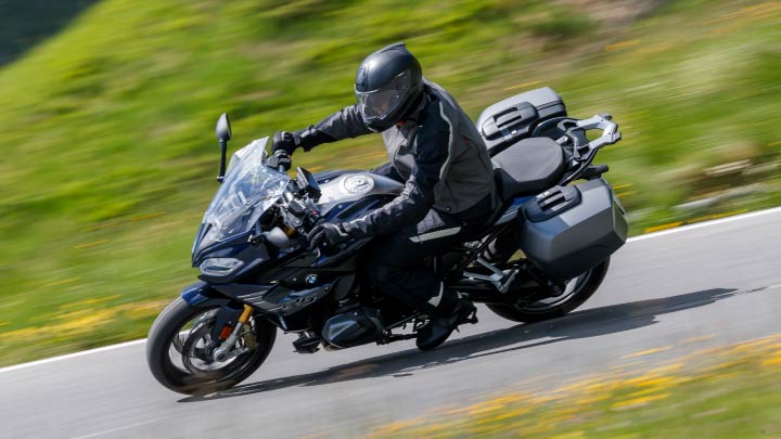 Motorcyclist Riding R 1250 RS On Mountain Road