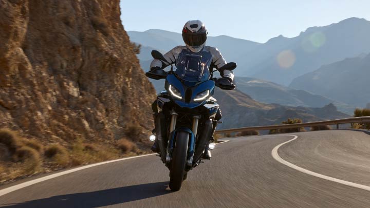 Motorcyclist Riding S 1000 XR On Road