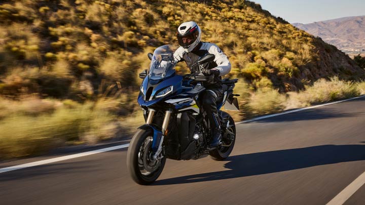 Motorcyclist Riding S 1000 XR On Road