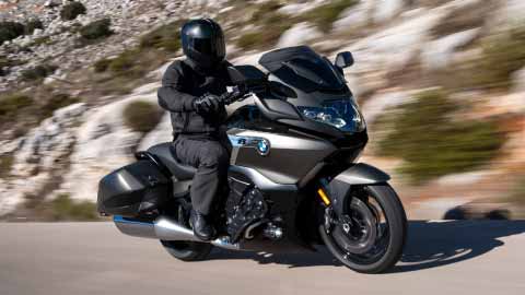 Motorcyclist Riding K 1600 B On Road