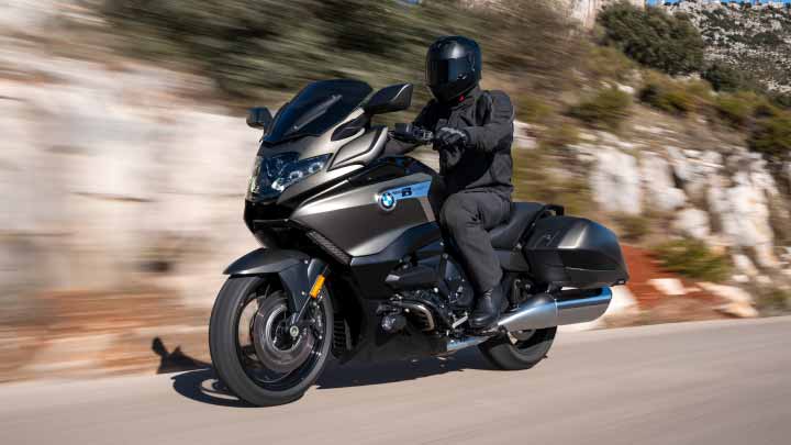 Motorcyclist Riding K 1600 B On Road