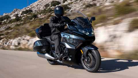 Motorcyclist Riding K 1600 Grand America On Road