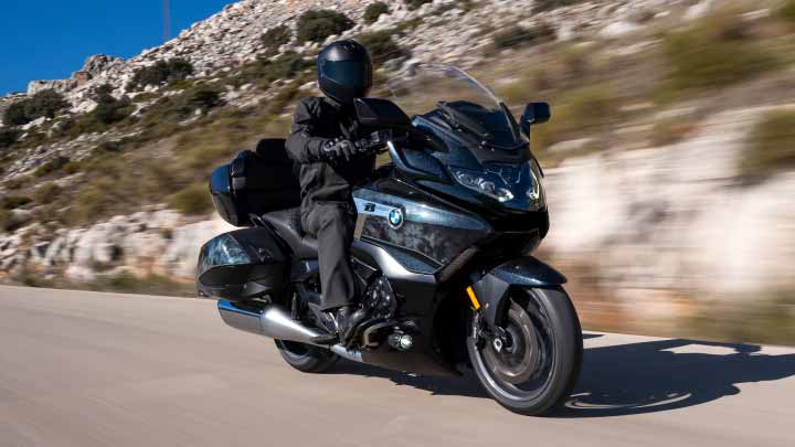 Motorcyclist Riding K 1600 B On Road