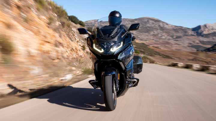 Motorcyclist Riding K 1600 B On Road