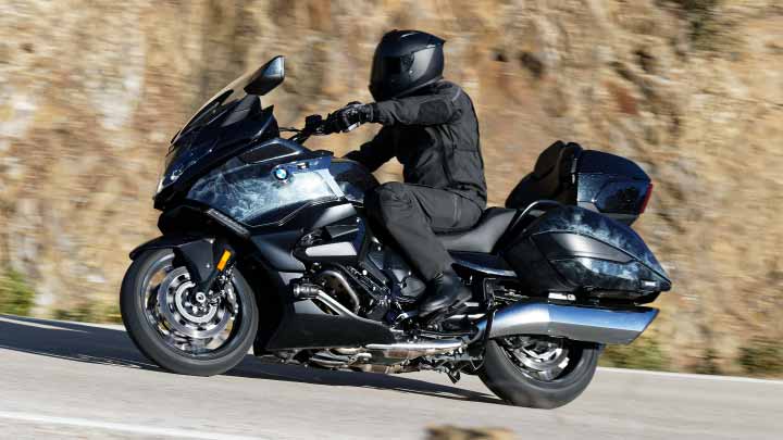 Motorcyclist Riding K 1600 B On Road