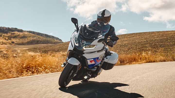 Motorcyclist Riding K 1600 GT On Road