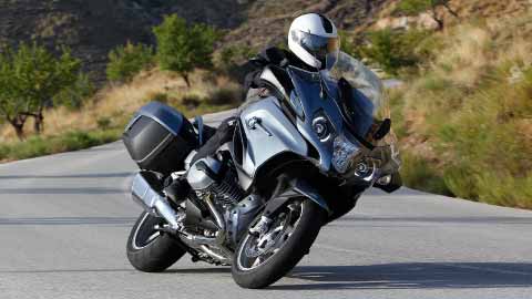 Motorcyclist Riding R 1200 RT On Road