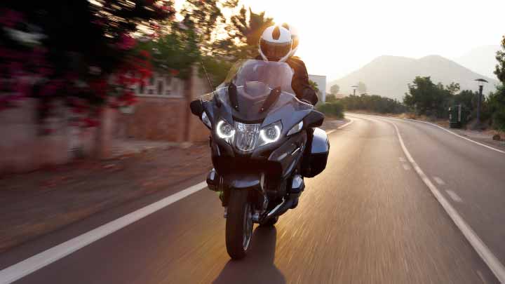 Motorcyclist Riding R 1200 RT On Road