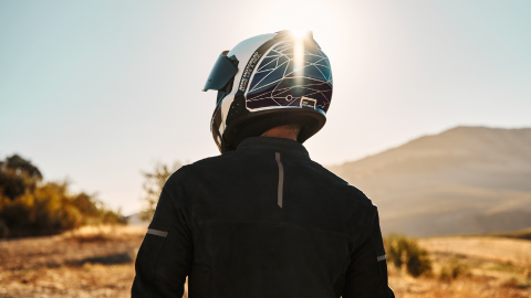 Back Of Man Wearing BMW Motorrad Motorcycle Helmet