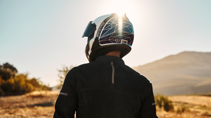Back Of Man Wearing BMW Motorrad Motorcycle Helmet