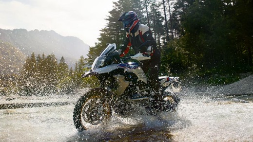 Motorcyclist Riding BMW Motorrad Bike Through Water