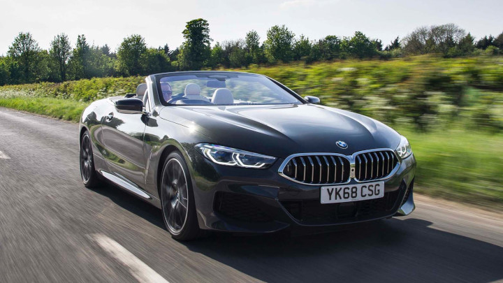 BMW 8 Series M Sport Exterior Front Driving on Country Road