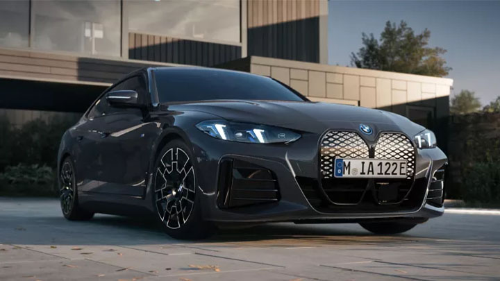 Stationary front quarter shot of a grey BMW i4