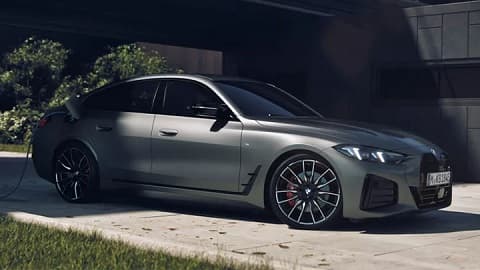 Stationary side shot of a grey BMW i4