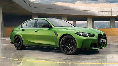 Front quarter shot of a green BMW M3 Competition