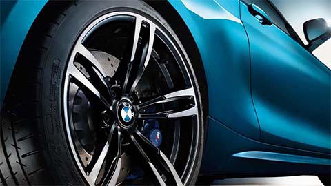 rear quarter shot of bmw m2 rear wheel