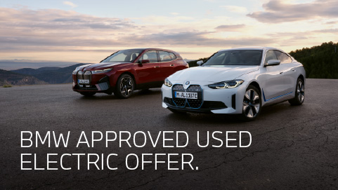 2 BMW vehicles with a scenic view background. White promotional text overlay.