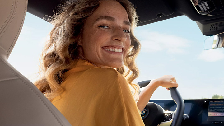 Woman Driving a BMW Model