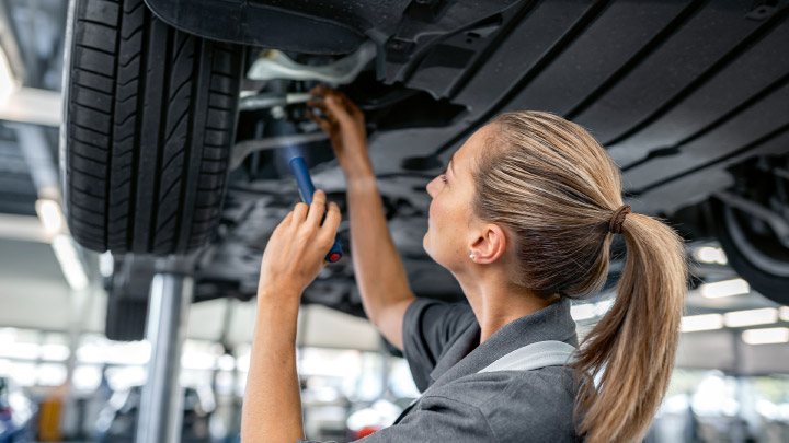 Technician Servicing BMW Tyre