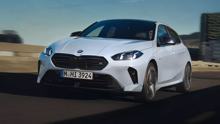 BMW 1 Series Driving in White